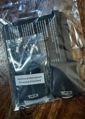 New Tumi Key Fob Key Chain w.extra Envelop in Light Gray/ Silver Logo Leather