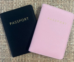 Two new passport covers for men and women (dark blue and pink).